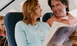 happy couple on airplane