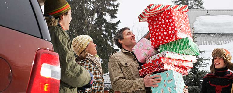 Allianz - man holding presents