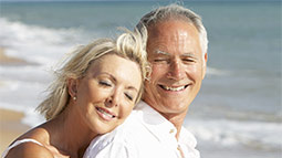 Allianz - mature couple on the beach