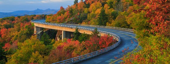 Allianz - Road on mountainside of blue ridge during fall