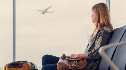 Allianz - lady at airport