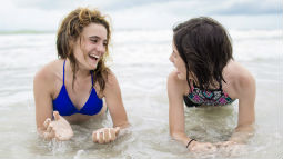 two girls at ocean