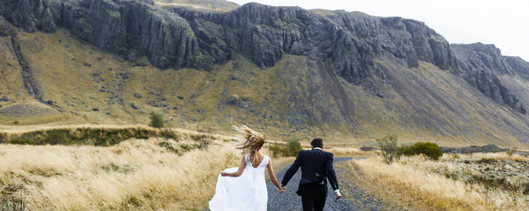 Allianz - Couple Running Towards Mountains