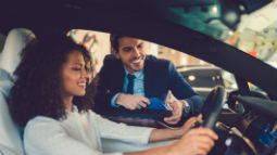 woman driving rental car