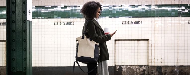 Allianz - woman waiting for subway