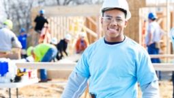 young man volunteering on vacation