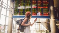 woman whose flight has been delayed