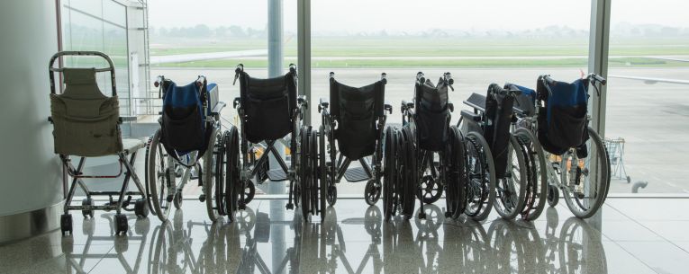 Allianz - row of wheelchairs at airport