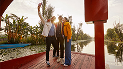 travelers taking selfie together