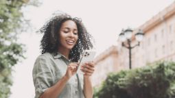 woman filing travel insurance claim online