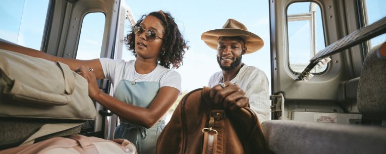 Allianz - travelers packing car for a trip