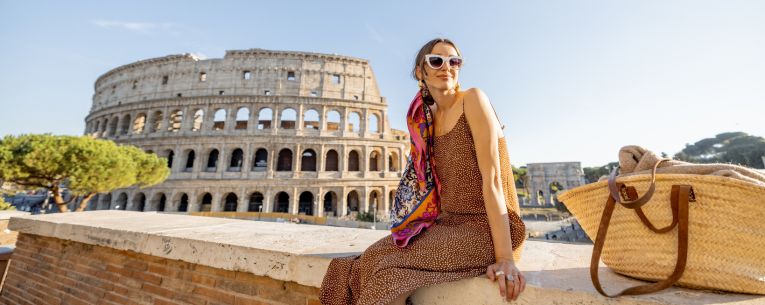 Allianz - woman sitting in front of the coliseum
