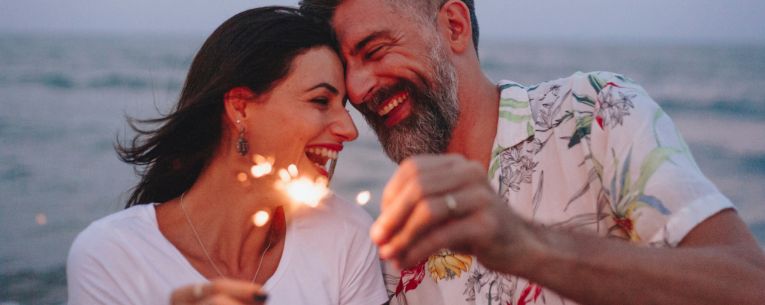 Allianz - couple celebrating fourth of july with sparklers